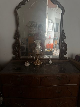 Conjunto de cama antiguo de madera tallada