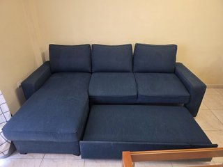 Sofá cama azul con almacenaje