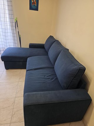 Sofá cama azul con almacenaje