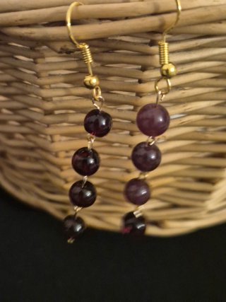 Pendientes largos artesanales morados