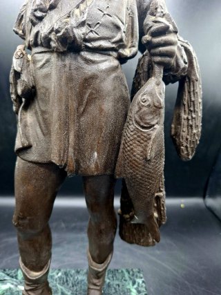 Escultura francesa de Pescador en Calamina.