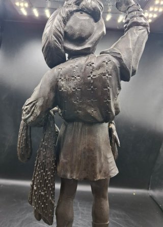 Escultura francesa de Pescador en Calamina.