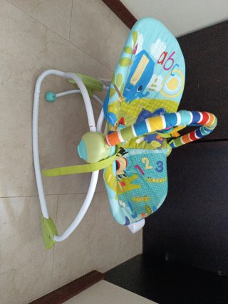 Hamaquita bebé con arco de juegos