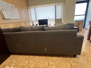 Sofá cama gris de tela