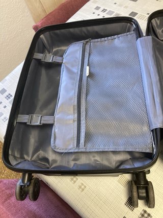 Maleta de viaje gris tiene una rueda reparada 10kg