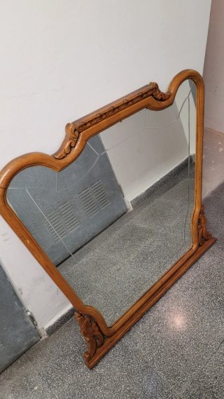 Espejo de madera tallada