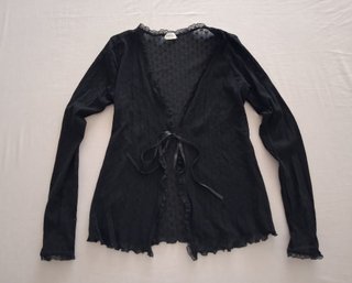 Corsé (S) y chaqueta Intimissimi.