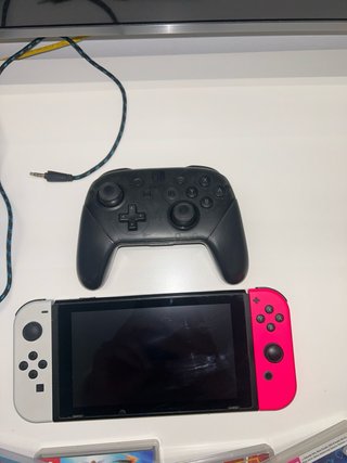 Nintendo Switch Rosa y Blanca + Juegos