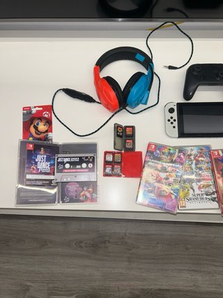 Nintendo Switch Rosa y Blanca + Juegos