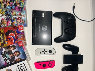 Nintendo Switch Rosa y Blanca + Juegos