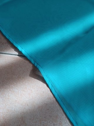 Copricostume velato azzurro