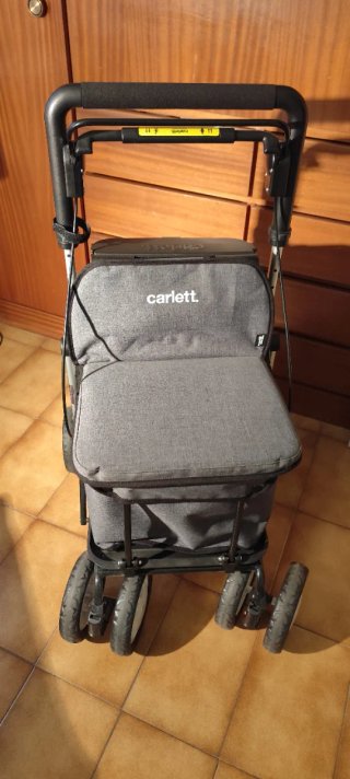 Caminador Carlett con asiento y cesta