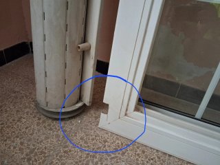 Ventana corredera con rejas