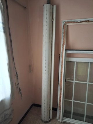 Ventana corredera con rejas