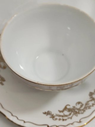 Taza y platillo de porcelana vintage dorado