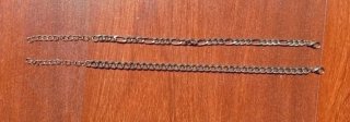 Par de pulseras de eslabones plateada