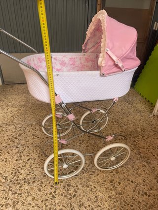 Cochecito de muñecas rosa