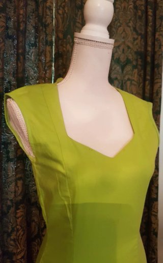 Traje de flamenca verde con volantes