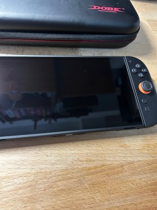Nintendo Switch Nera + Custodia Dobe
