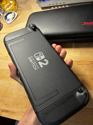 Nintendo Switch Nera + Custodia Dobe