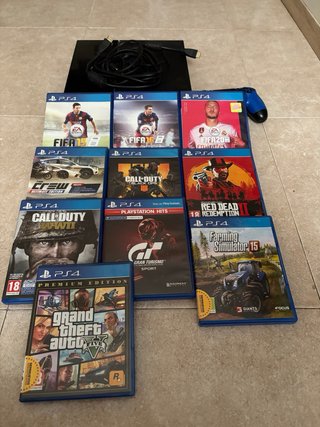 PS4 (PlayStation 4) Nera + Controller Blu + 10 giochi