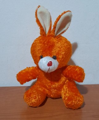 Peluche de conejo naranja