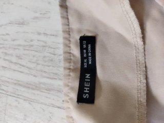 Blusa beige manga abullonada