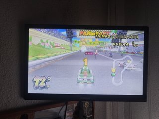 Nintendo Wii + Mario Kart Wii + 2 Mandos