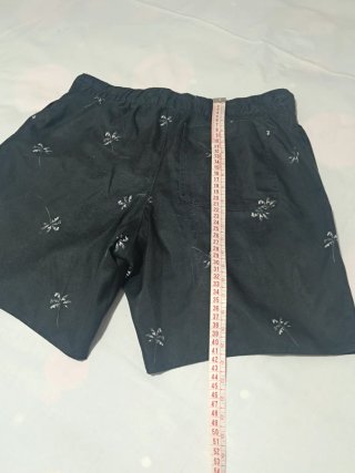 Bañador negro palmeras