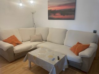 Sofá modular tela beige y azul