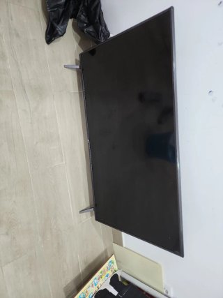 Televisor LG Negro con golpe 55 pulgadas