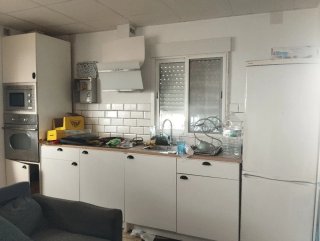 Cocina con electrodomesticos