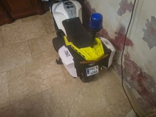 Moto infantil blanca y amarilla de batería 12 v