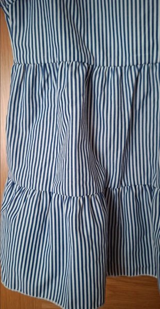 Blusa de niña, sin mangas. Talla 7 años.