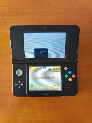 New Nintendo 3DS Nero + Caricabatterie + 9 Giochi