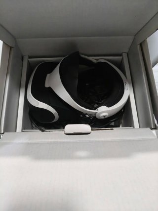 PS VR con cascos,no contiene los juegos de la caja