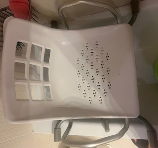 Silla bañera giratoria practicamente sin usar.