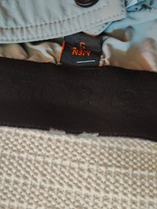 Pantalones Trangoworld grises y verde oliva