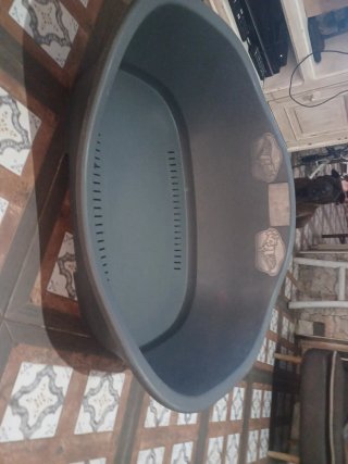 Cama grande para perro gris