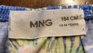 Conjunto Mango: Top y bermuda estampado tropical.