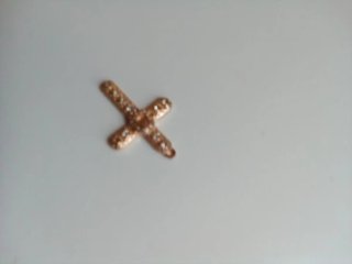 Cruz de oro puro 24k con diamantes