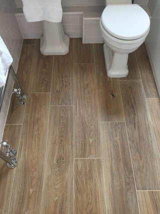 Reforma de Baño Alicatador solador tarima vinílico