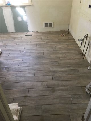 Reforma de Baño Alicatador solador tarima vinílico