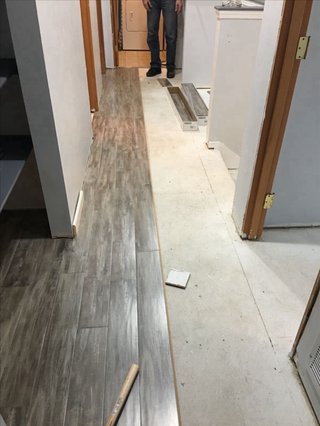 Reforma Alicatador solador baño Tarima suelo SPC