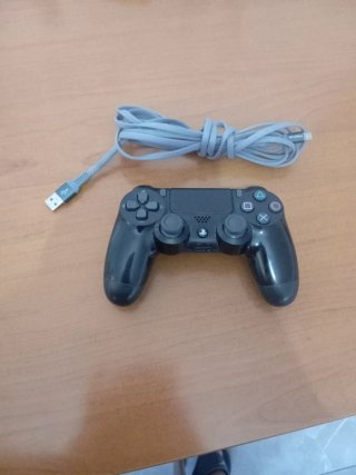 Mando PS4 Sony seminuevo con cargador