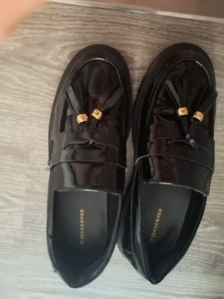 Mocasines negros con flecos