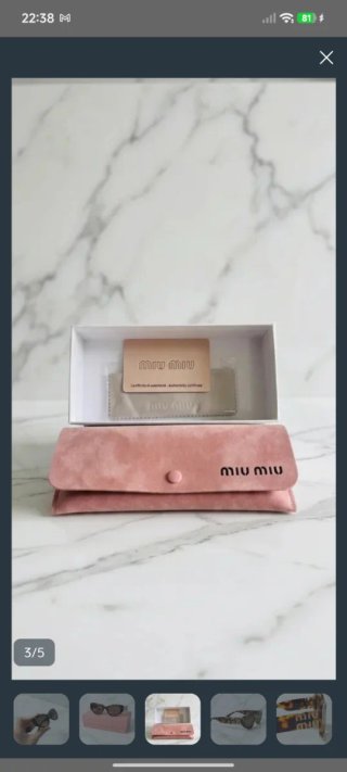 Gafas de sol Miu Miu retro ovaladas negras