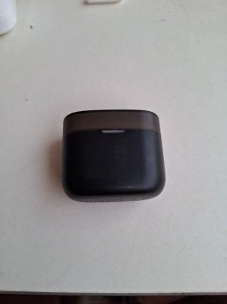 Cajas auriculares Philips y Redmi negras