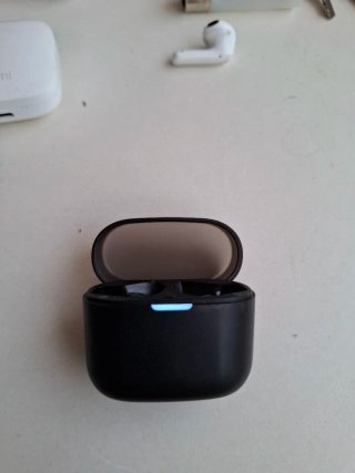 Cajas auriculares Philips y Redmi negras