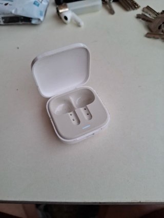Cajas auriculares Philips y Redmi negras